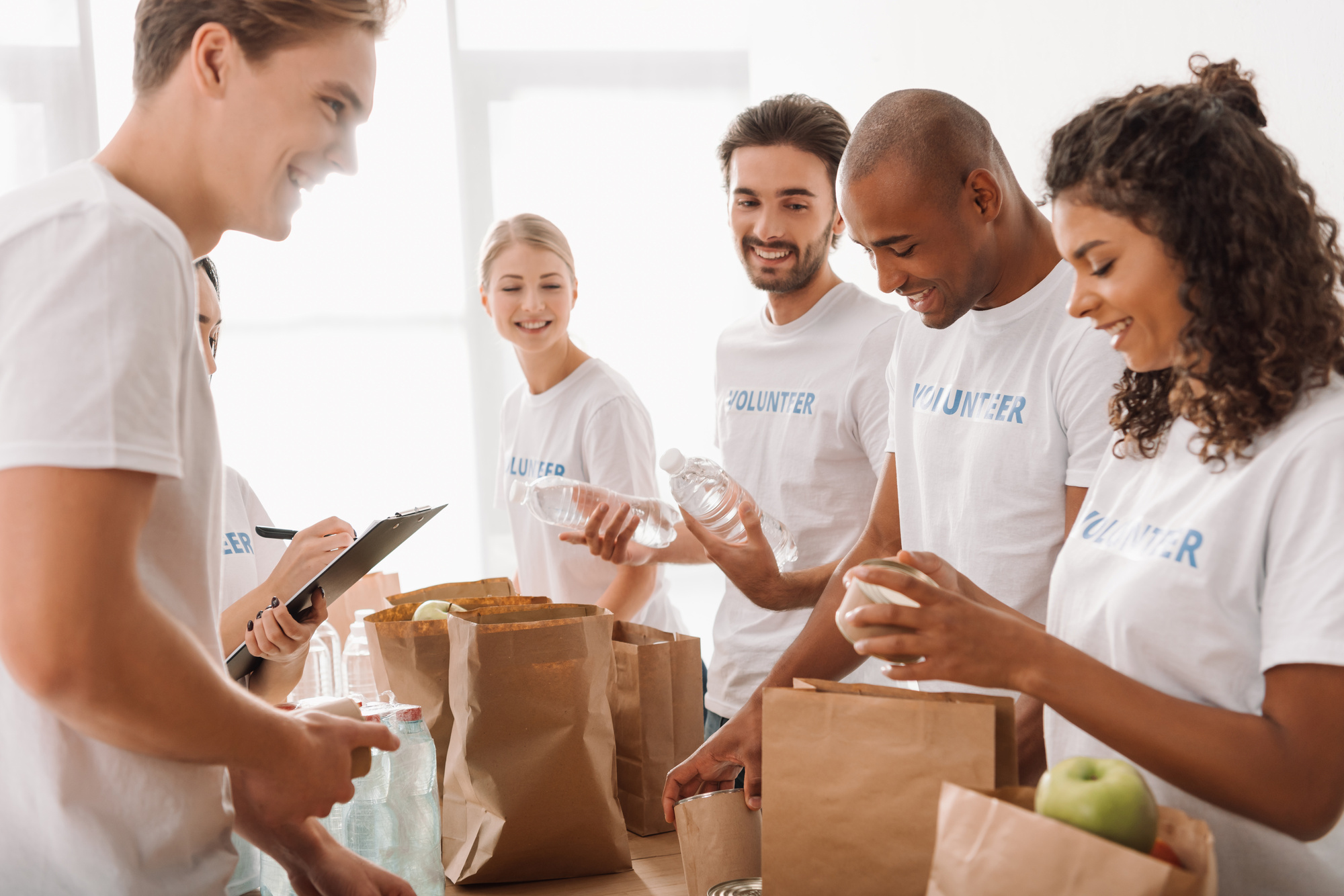 volunteers bagging food